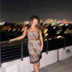 Mesh top and bottom. Size lrg. Beaded floral both top and bottom.